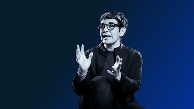 a woman gesticulating as she speaks