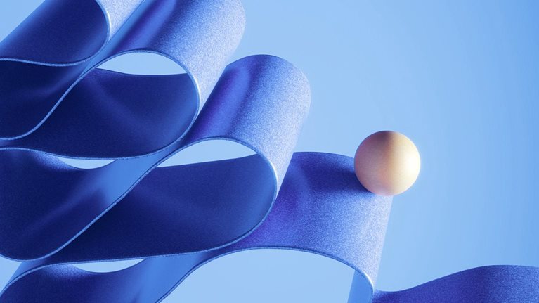 A ball balancing on a twisted ribbon that is running down screen