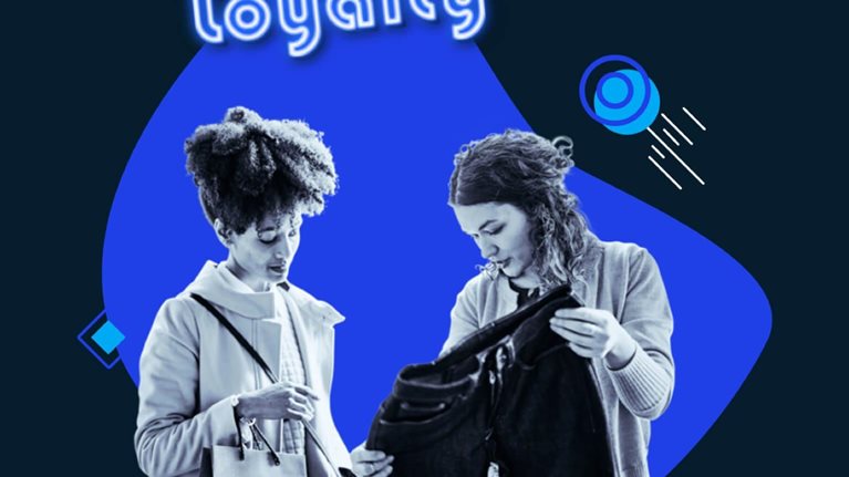 two girls shopping for denim jeans