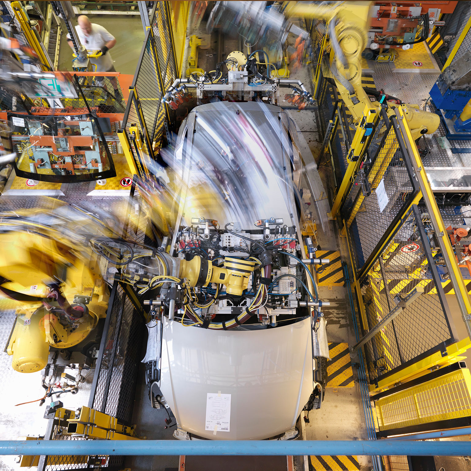 Building smarter cars with smarter factories: How AI will change the auto business