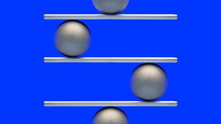 Balance concept with balls - stock photo