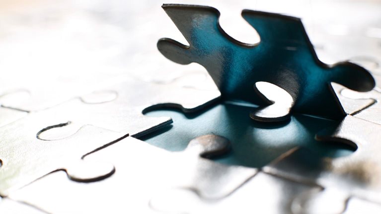 Jigsaw piece backlit photo