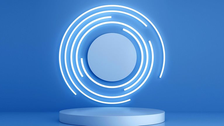 Image of a product riser with circular lights framing it.