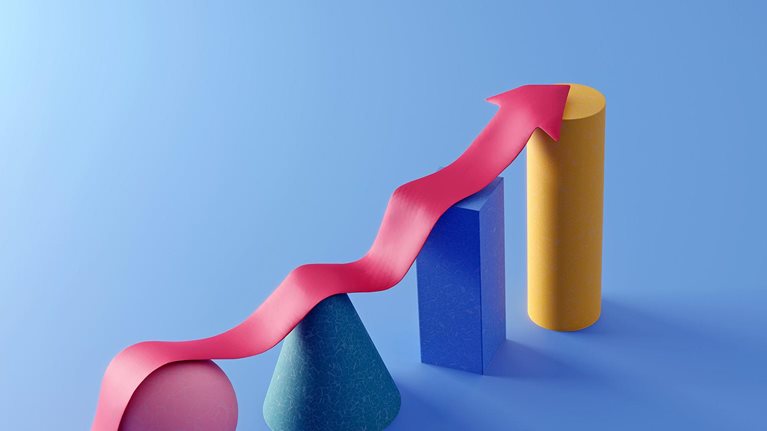 Rising arrow shape on multi-colored sphere, cone, box and cylinder, symbolizing financial graph