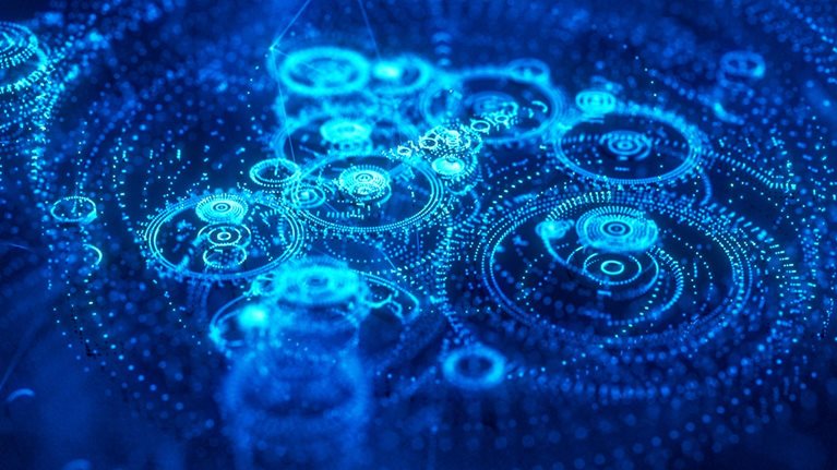 Image of digital light shaped like intricate clockworks.