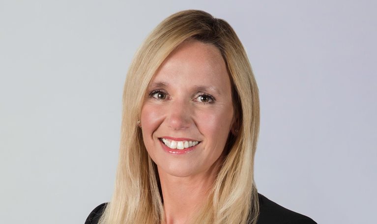 Portrait of a smiling Claire Bramley.