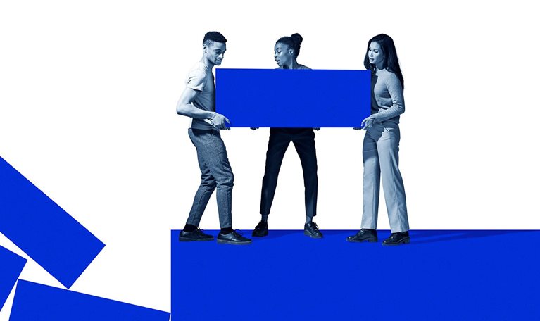 Image of a side view of a woman carrying large electric blue block.