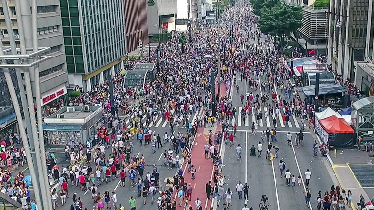 Overhead shot of pedestrians on crowded street in Sao Paulo
