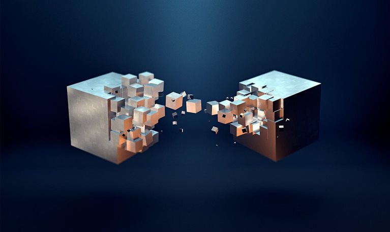 An abstract image of two metallic golden cube formations with smaller cube pieces connecting and transferring between them.