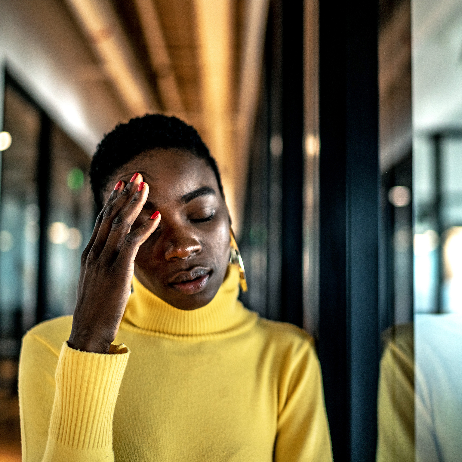 Young Black women looking stressed