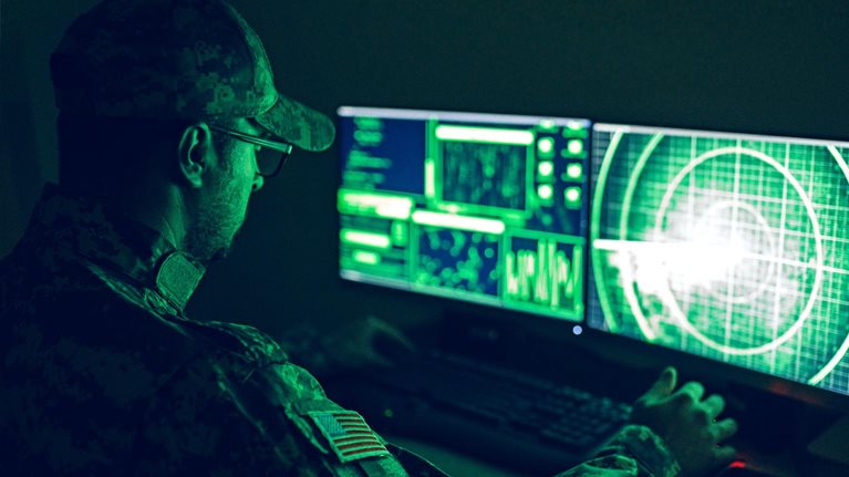 American soldier in headquarter control center