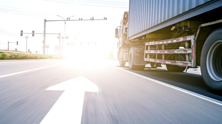 Truck running on road