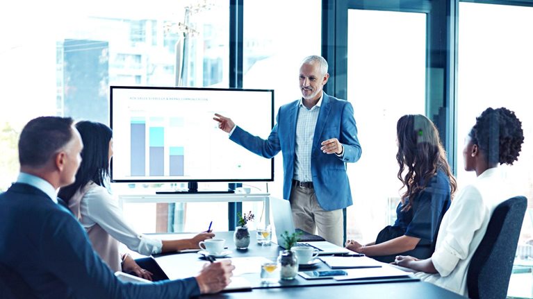 Businessman giving a presentation in a boardroom