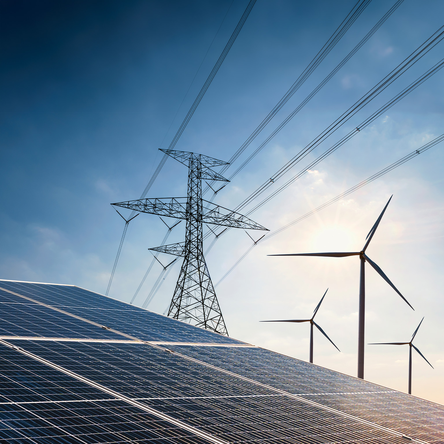 Solar panel with turbine and tower high voltage - stock photo