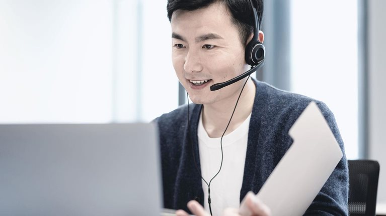 Business people negotiate business through video