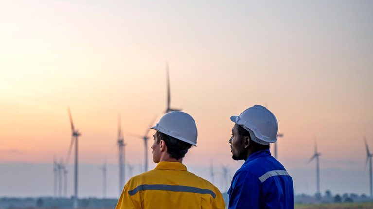 Windmills and Workers - stock photo