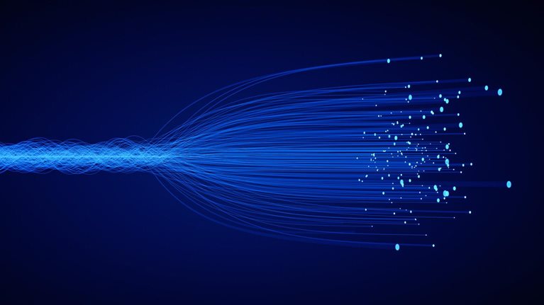 Filaments of light that go from a compact collection to a dispersed array.