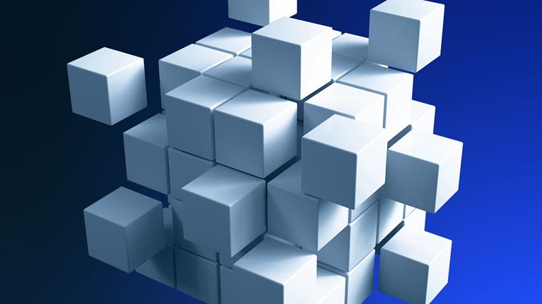 A cube made of smaller cubes coming together to fit into the right places