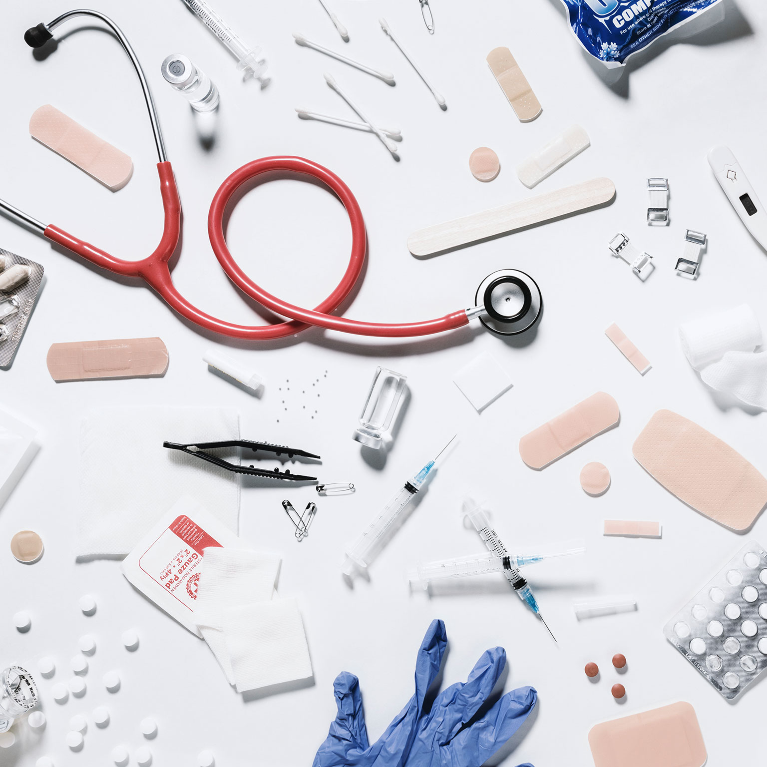 Variety of medical supplies on white background