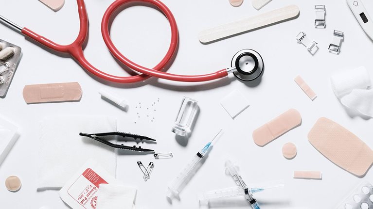 Variety of medical supplies on white background