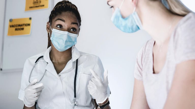 COVID-19 vaccines meet 100 million uncertain Americans