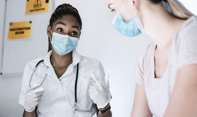 COVID-19 vaccines meet 100 million uncertain Americans