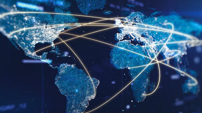 Global communication network on a glowing particle world map. - stock photo