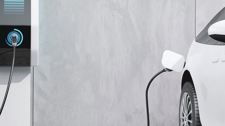 Electric car being charged