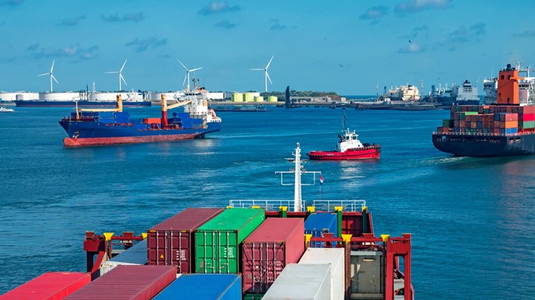 Containers on shipping vessels at sea